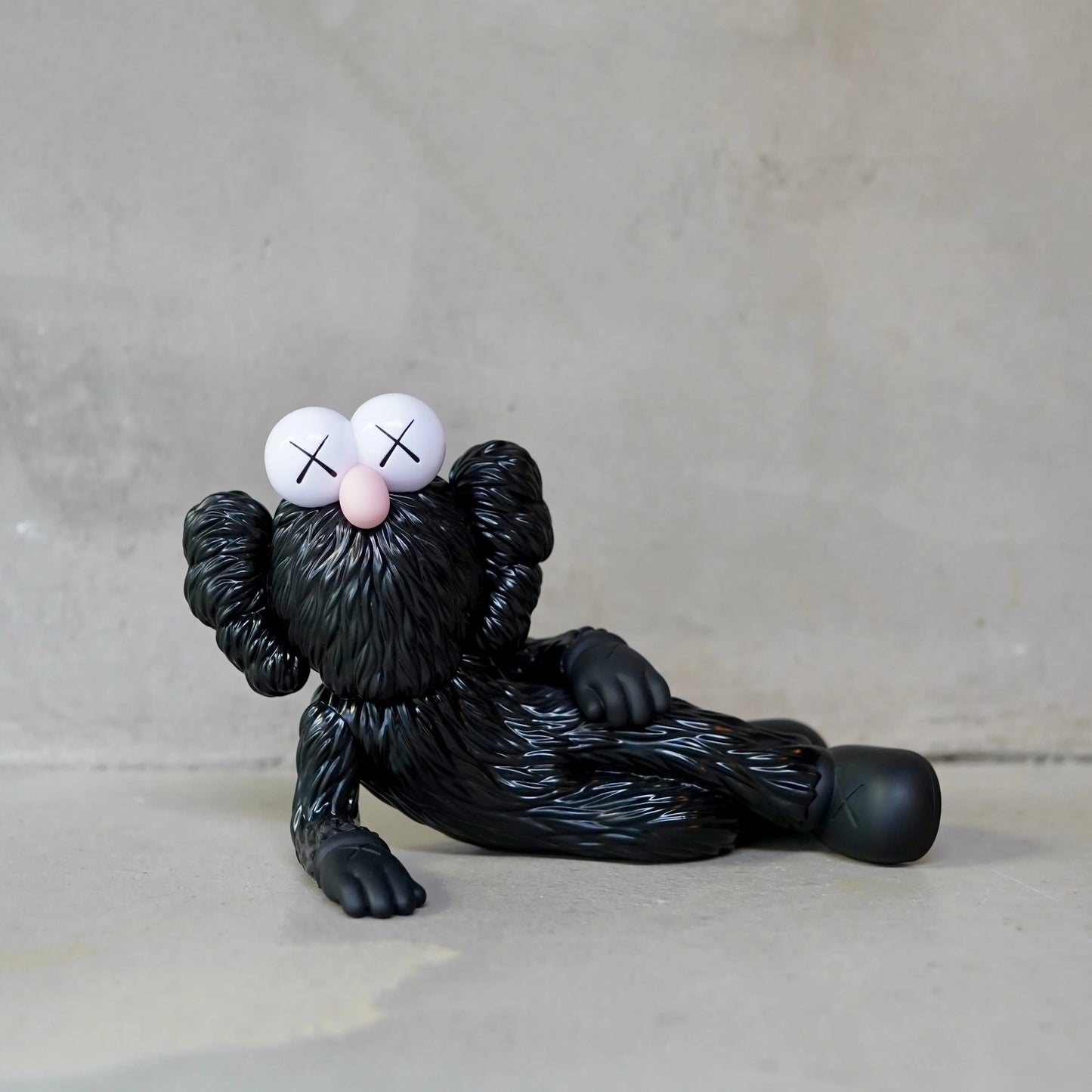 KAWS TIME OFF Vinyl Figure Black OKO MAISON