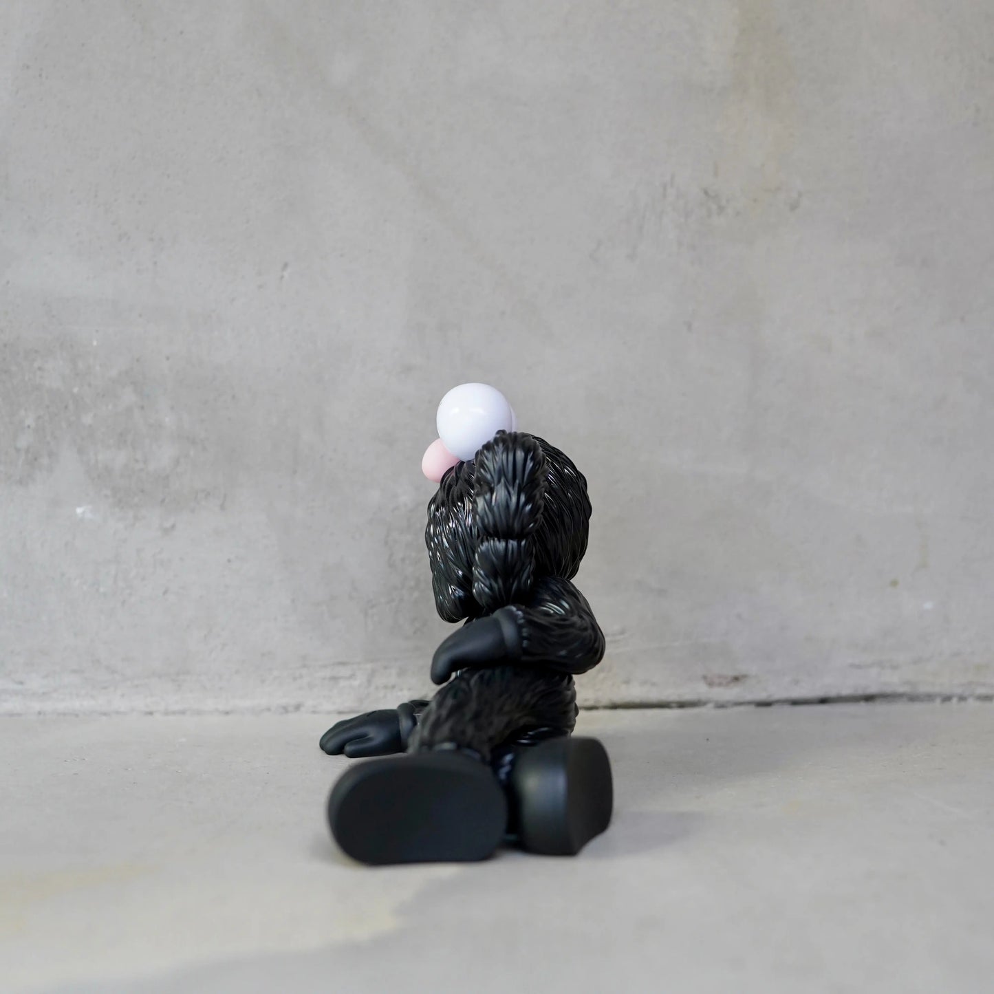 KAWS TIME OFF Vinyl Figure Black OKO MAISON