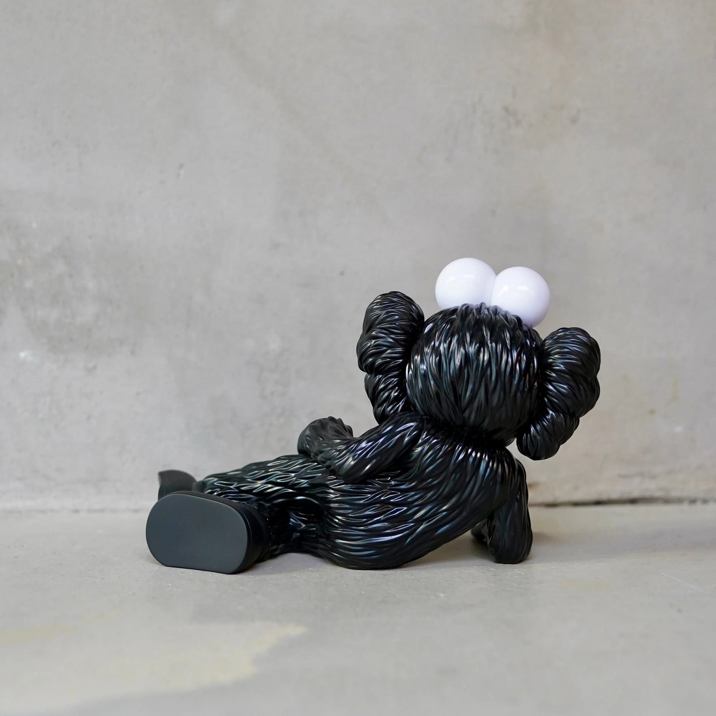 KAWS TIME OFF Vinyl Figure Black OKO MAISON